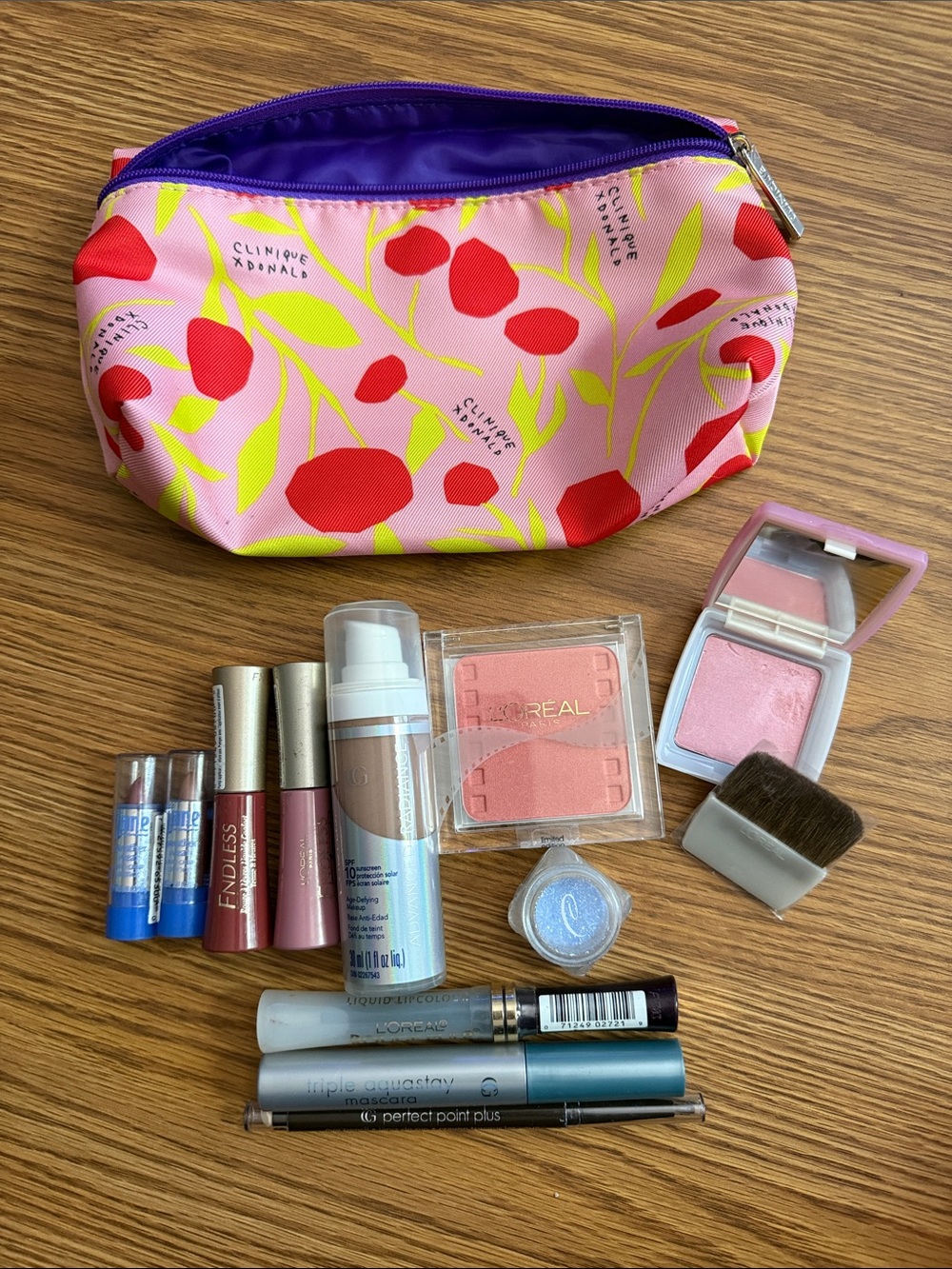 Clinique Pink Cherry Print Makeup Bag with Purple Interior & Essentials